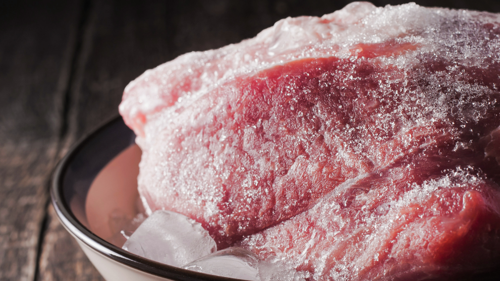 Frozen steak prepared for cooking straight from freezer